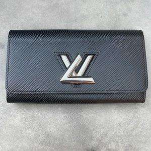 Louis Vuitton Black twist Epi wallet.